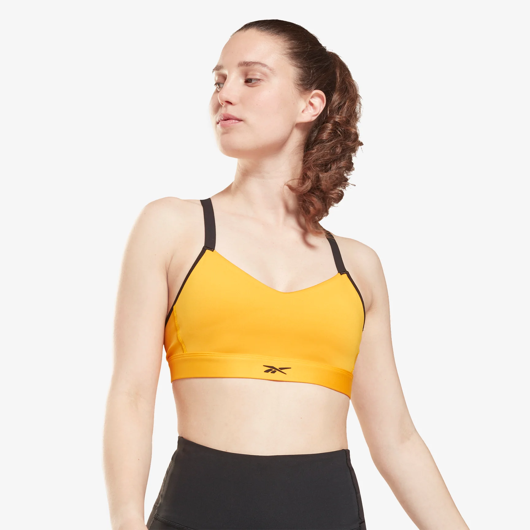 TOP REEBOK LUX STRAPPY - MEDIUM IMPACT